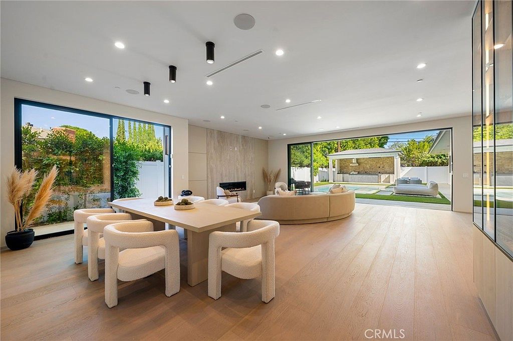 Dramatic floating staircase with indoor garden